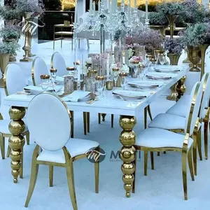 イベントパーティーの装飾のための豪華な金と白の長い長方形の形の結婚式のダイニングテーブル