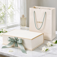 Boîte cadeau rigide magnétique de luxe personnalisée en carton gris pour emballage cosmétique avec ruban et poignée pour parfum et soins de la peau