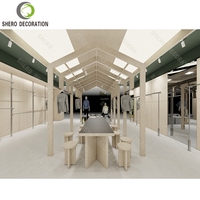 Aménagement de magasin de vêtements de sport, décoration complète du magasin, design intérieur épuré, mobilier de magasin de vêtements, vitrine, étagère murale