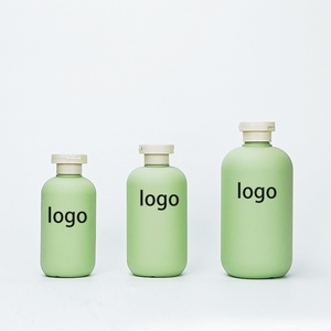 Botella de Plástico Redonda Verde de Lujo para Acondicionador de Cabello, HDPE, con Tapa y Envoltura Protectora para Envasado de Cosméticos, en Oferta - Product Image 1