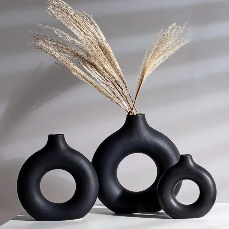Florero minimalista moderno decoración del hogar circular hueco negro rústico moderno jarrón de cerámica anillo redondo donut jarrón