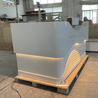 Comptoir d'accueil en forme de L, bureau d'information contemporain pour cabinet médical, fabricant chinois OEM de comptoirs de réception pour salons de beauté