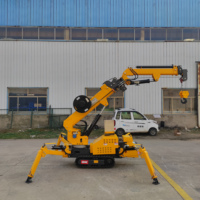 Mini-grue araignée sur chenilles en caoutchouc non marquant avec ventouses à vide pour la manutention de panneaux et la décoration de sols en marbre