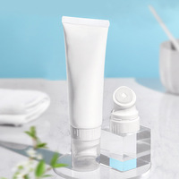 Tube de nettoyant pour le visage de 120 ml avec applicateur de massage à tête de brosse en silicone, emballage de tube cosmétique