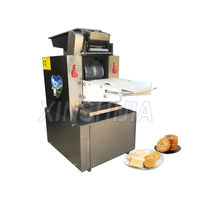 Chine Machine automatique de fabrication de biscuits mous pour chiens à petite échelle mini déposant de biscuits aux noix pour petites entreprises