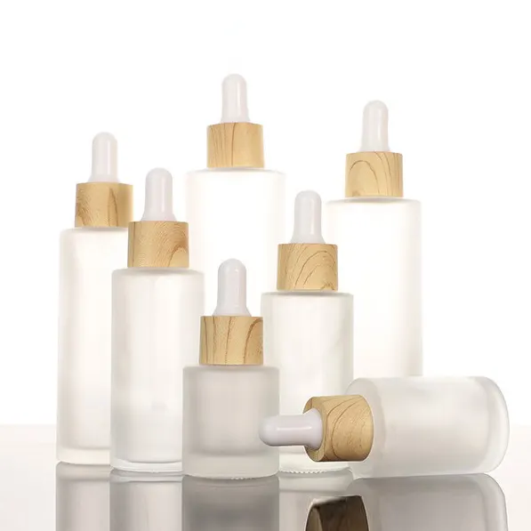 Buzlu mat parlak dolu yağ kabı kirpik yağı kozmetik şişe Botella paketi bambu çevre dostu cam göz damlalıklı ahşap