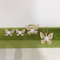 SHDIYAYUN Vente chaude Ensemble de bijoux de luxe en zircon, papillon féerique, perle d'eau douce naturelle, boucles d'oreilles, collier, bagues