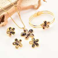 Ensemble de bijoux en acier inoxydable, collier, bracelet, boucles d'oreilles et bague, motif léopard vintage à la mode