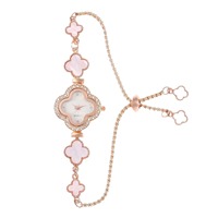 Montre élégante et tendance pour femme, avec un charme incrusté de diamants, trèfle à quatre feuilles, mouvement à quartz, résistance à l'eau 3BAR, verre en alliage