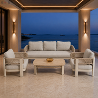 Ensemble de canapés de patio extérieur moderne avec structure en aluminium thermolaqué, meubles de jardin en corde d'oléfine tressée et table basse en pierre frittée