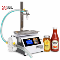 Machine de remplissage semi-automatique pour liquides visqueux (miel, pâte, sauce, huile, crème, yaourt, confiture) en bouteilles et bocaux en verre, PET, plastique