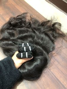 Prix de gros à l'exportation Noir brut ondulé qualité supérieure non traité 100% naturel donneur unique Extensions de cheveux humains du temple indien - Product Image 4