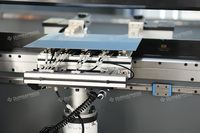 Presse plieuse CNC haute précision DP-ES Genius DA69S 200T 3200mm 8+1 axes avec bras robotisé pour la production de pièces automobiles