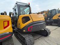 Mini-pelle sur chenilles XE90U à bras articulé court, godet de 0,33 m, garantie 1 an, pour usage en construction
