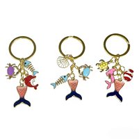 Ensemble de porte-clés sur le thème de l'océan personnalisé, porte-clés en émail avec des créatures marines, breloques en forme d'arête de poisson, de crabe, de queue de sirène pour les fournitures de magasins de cadeaux marins