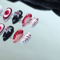 Uñas artificiales hechas a mano, pétalos rojos pintados a mano tallados tridimensionales, fábrica reutilizable de alta calidad al por mayor.