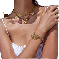 Ensemble de colliers populaires européens et américains en acier inoxydable plaqué PVD or 18 carats, à la mode, papillon, fleur, résine, couleur goutte-pâte