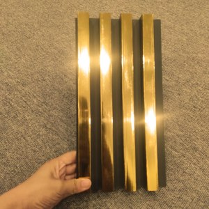 Panneau mural GARBON en WPC doré brillant, matériau de panneau sans éclats, revêtement en <span class=keywords><strong>film</strong></span> PVC, durée de vie de 30 ans, garantie de 5 ans, facile à installer - Product Image 1