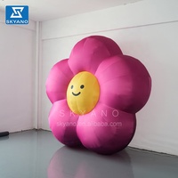 Publicité gonflable décoration gonflable violet pétale jaune sourire visage fleur pour événements décor