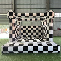 Location de châteaux gonflables : Combo Château Gonflable Voiture de Course à Carreaux Blanc et Noir avec Toboggan