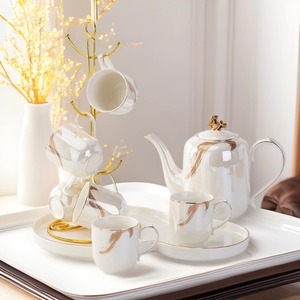 Service à thé en céramique haut de gamme de style chinois pour la maison, idéal pour la table basse du salon. - Product Image 4