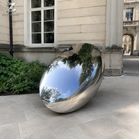 Sculpture en acier inoxydable poli miroir, motif galet, polie à la main, art abstrait pour la décoration extérieure des places publiques, jardins, entrées d'hôtels et aménagements paysagers