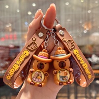 Explosif Creative Capibala Porte-clés Mignon Dessin Animé Pendentif UV Imprimé Eau Dauphin Poupée Silicone Couple Voiture Porte-clés PVC