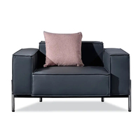 Dieses luxuriöse schwarze Ledersofa-Set mit schlichtem Design eignet sich für den Einsatz in Home-Office-Lounges und Büros.