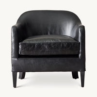 Chaise club en cuir de smoking français des années 1950 inspirée de la campagne de conception Sassanid et de l'ameublement Safari