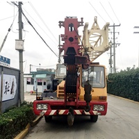 Grue mobile sur camion TADANO TL300E d'occasion de 30 tonnes avec système hydraulique d'origine, flèche complète de 33,5 m pour travaux de levage en construction
