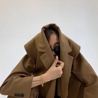 2025 OEM personnalisé nouveau printemps haut de gamme élégant dame Blazer veste à manches longues simple boutonnage femmes surdimensionné Blazer manteau avec ceinture