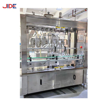 Machine de remplissage et d'emballage automatique à 6 têtes à pompe magnétique à prix abordable pour bouteilles de boissons et d'aliments, facile à utiliser et économe en énergie