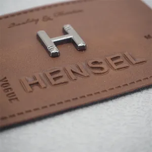 Лучшие продажи на заказ коричневый на основе металлического логотипа искусственная кожа патчи для джинсов