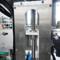 Ligne de production automatique rotative pour le remplissage, le bouchage, l'étiquetage et l'emballage de flacons de parfum