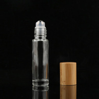 Bouteille transparente écologique rouleau d'échantillon d'huile essentielle de parfum 10ml rouleau en verre sur bouteille avec couvercle et rouleaux en bambou