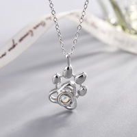 Collier à breloques avec pendentif imprimé de chien de compagnie Collier à projection de patte de chat en plaqué or
