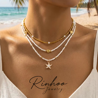 Collar RINHOO Boho Multicapa con Estrellas de Mar, Conchas y Cuentas de Arroz, Collar Vintage para Mujer con Imitación de Perlas, Gargantilla Apilada, Joyería para Fiesta en la Playa
