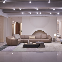 Ensemble de canapés d'angle en L incurvé de designer, en cuir véritable épais et rembourré en éponge, pour salon de villa de luxe moderne