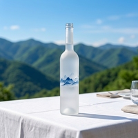 Bouteille de vodka en verre transparent de fabrication chinoise, 750 ml, cylindrique, avec bouchon, logo personnalisé, givrage, sérigraphie, estampage doré