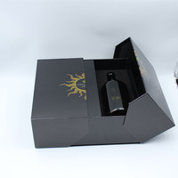 Boîte cadeau en carton noir à double porte ouverte pour l'emballage d'artisanat