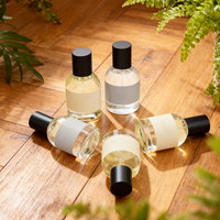 Flacon de parfum en verre vide de luxe rond avec logo personnalisé en gros, 30 ml, 50 ml, 100 ml, vaporisateur