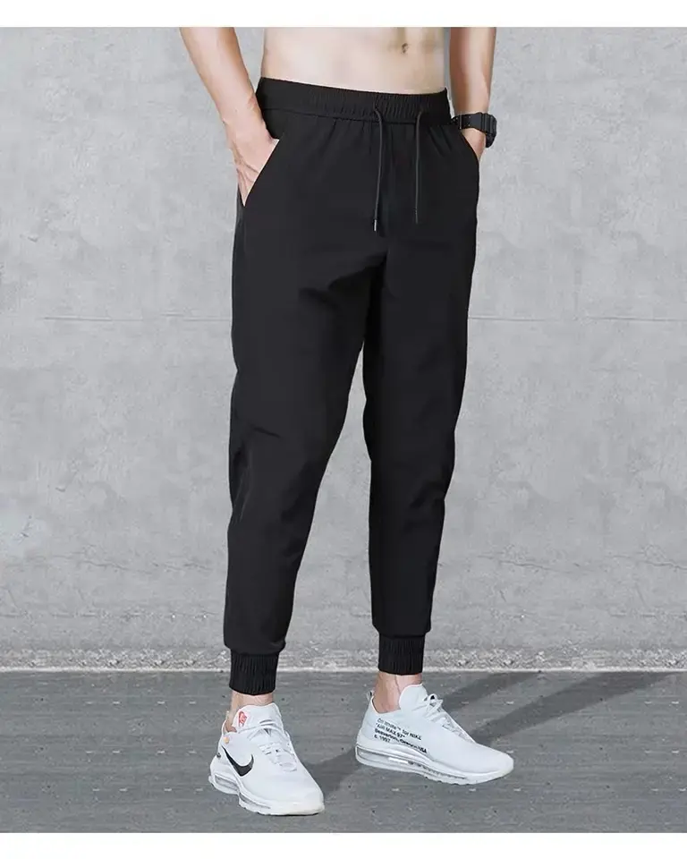 Pantaloni Casual sottili estivi Oem personalizzati pantaloni larghi da uomo in seta di ghiaccio primaverile nuovi pantaloni sportivi ad asciugatura rapida pantaloni di tendenza leggeri da uomo