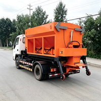 Épandeur auto-vidangeur hydraulique à crochet pour conteneurs de déchets