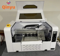 Qinyu terlaris Digital Dual XP600 DTF Printer A3 T-shirt mesin cetak A3 DTF Inkjet Printer untuk kain tekstil pencetakan