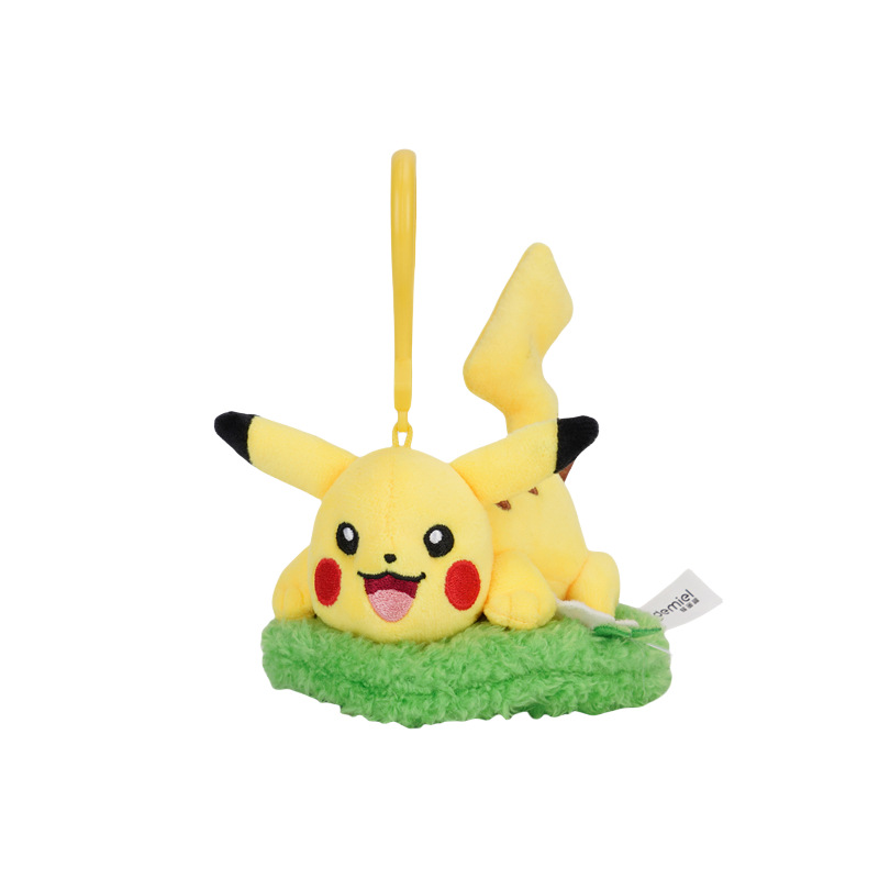 Pendentif Pikachu 11,5 cm, style "riant dans la prairie"