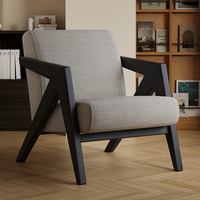 Fauteuil de salon moderne de luxe nordique en bois massif, confortable et élégant, avec design décoratif capitonné pour salon et chambre à coucher