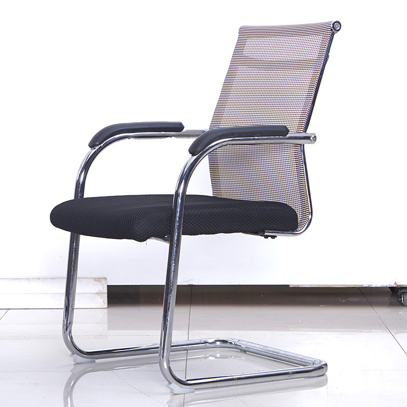 Sitting on a black back, light brown