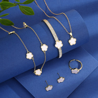 Juego de Joyería de Latón con Diseño de Trébol de Cinco Hojas, 7 Piezas, Chapado en Oro, Collar, Aretes y Pulsera para Mujer, Ideal para Bodas y Fiestas, Venta al Por Mayor