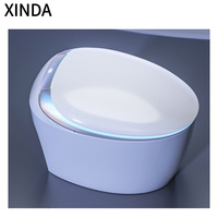 WC intelligent de luxe moderne en céramique monobloc allongé avec télécommande, fixation au sol, désodorisation automatique et double chasse d'eau