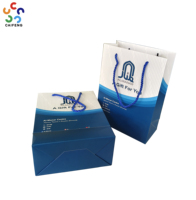 Bolsa de Cartón Blanca de Lujo Personalizada con Logotipo en Dorado para Empacar Ropa, Vestidos, Regalos, Compras, Manualidades, con Asa Elegante
